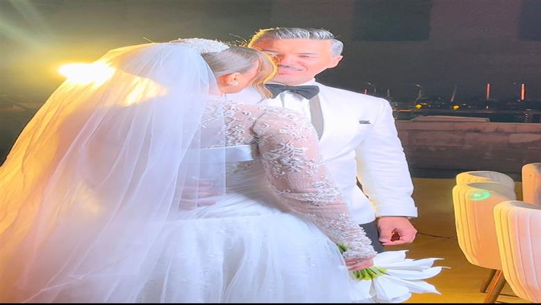 هايدي موسى وزوجها محمد غانم<br>