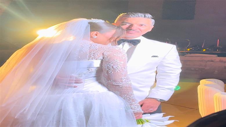 هايدي موسى وزوجها محمد غانم<br>