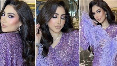 بوسي تتألق في أحدث جلسه تصوير بفستان لامع مزين بريش