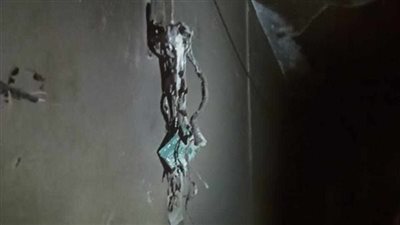 ماس كهربائي السبب وراء حريق شقة سكنية في العمرانية.. صور